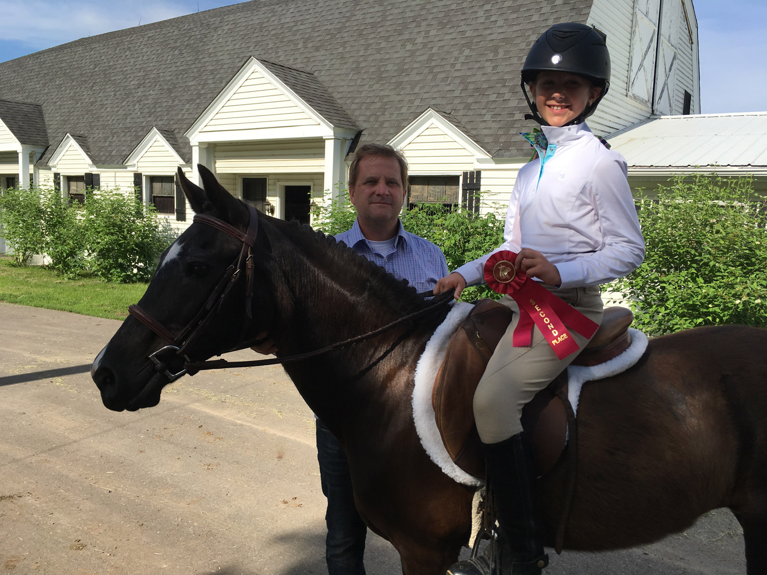 Isabella and Tom McCadden after the St Croix Horse Show with award